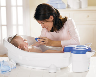 Mommy giving baby a bath